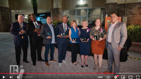 The ABR® Hall of Fame inductees holding their awards and posing for a group photo at NAR NXT